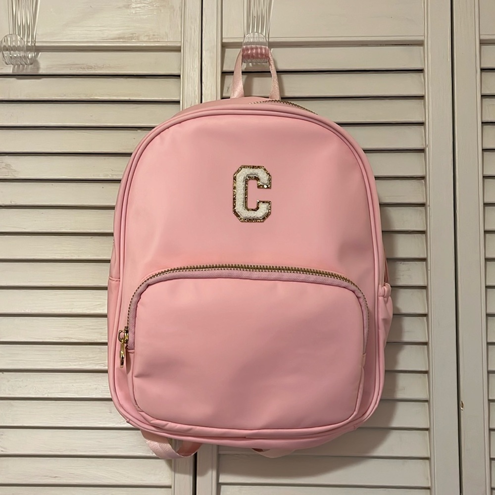 Stoney Clover Lane Flamingo Pink backpack with letter “C” iron on